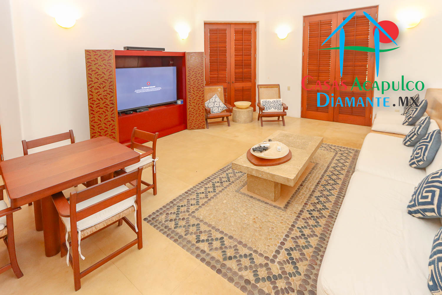 Tres Vidas Casa Mía - Sala de televisión y juegos 1